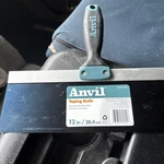 One Anvil 12" Taping Knife Blue Flexible Blade Comfort Handle. Fixed Price $10.99.